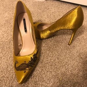 4 in gold peacock heels